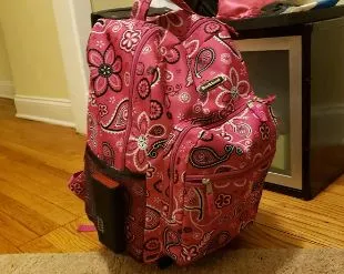 Rockland Double Handle Rolling Backpack